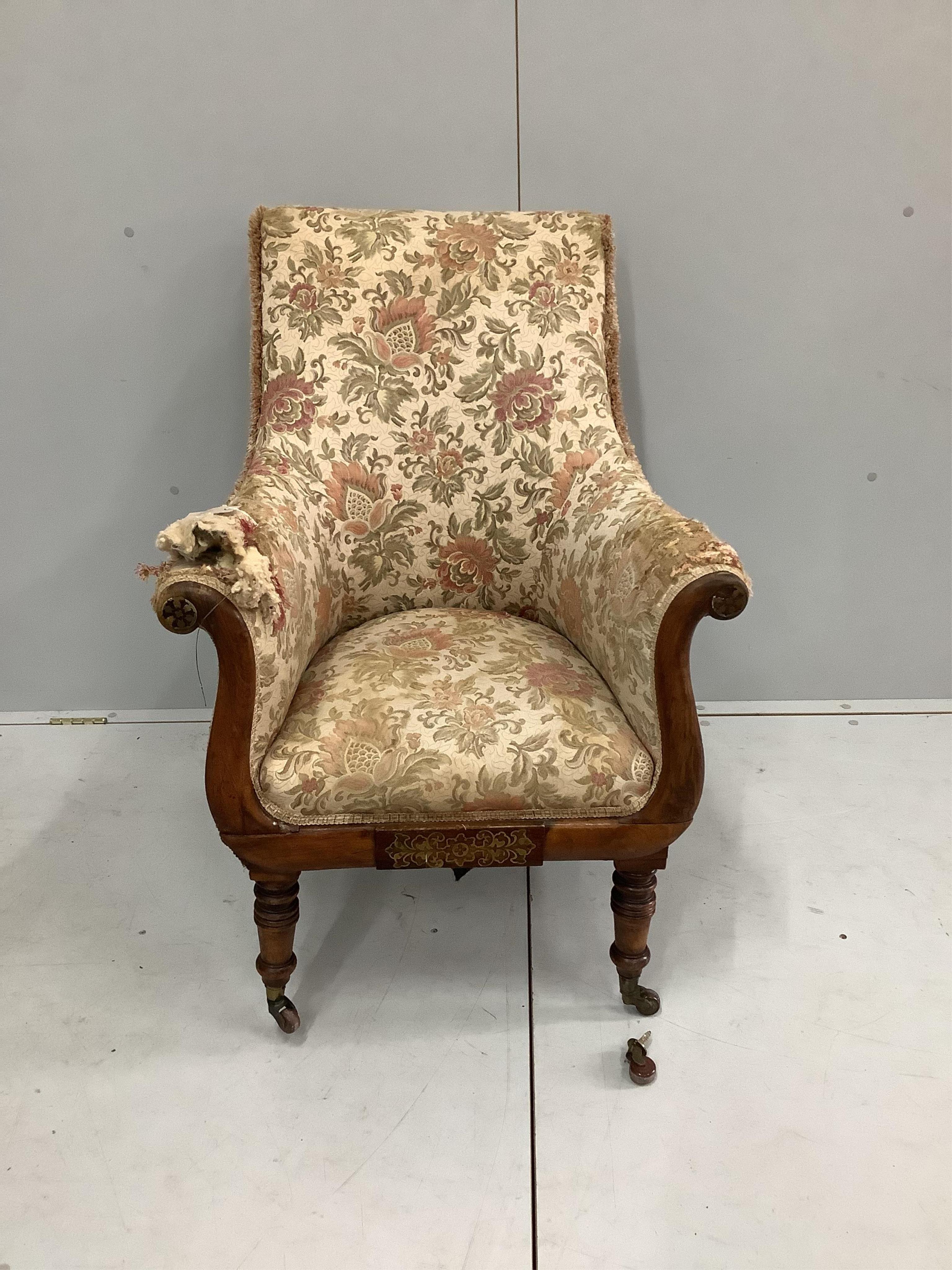 A Regency cut brass inlaid rosewood armchair, width 65cm, depth 70cm, height 92cm. Condition - poor to fair